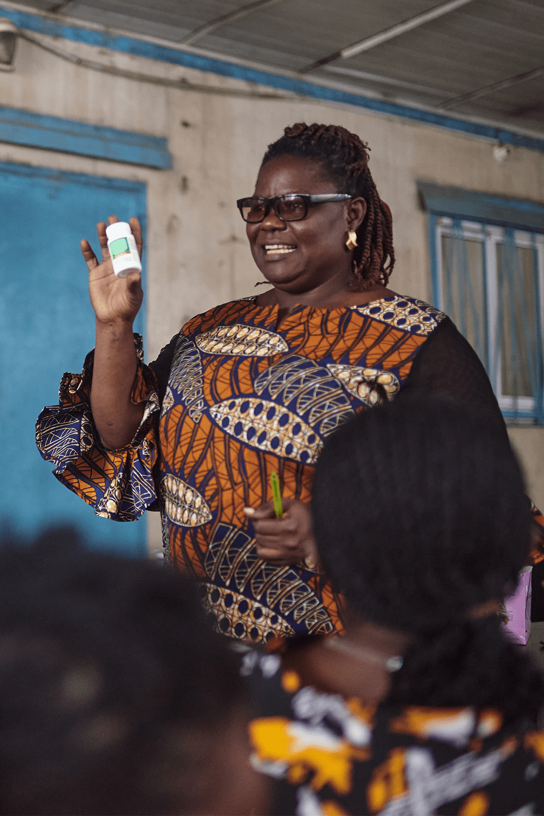 Female provider at a clinic in Nigeria taking women through counseling